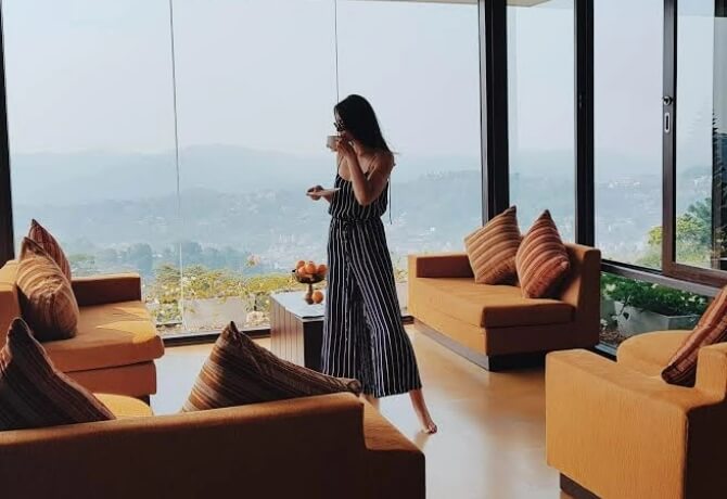 Relaxing with coffee in the stunning Penthouse at Theva Residency