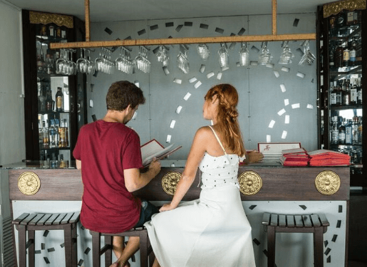 Couple relaxing in the charming bar at Theva Residency Kandy