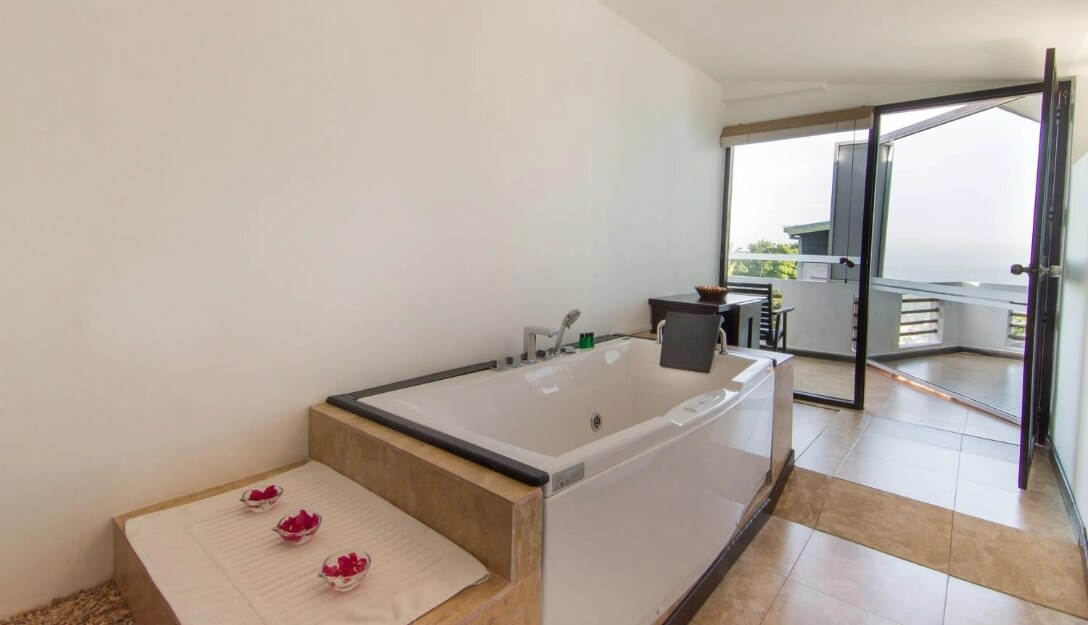 Elegant bathtub in luxurious room at Theva Residency Kandy