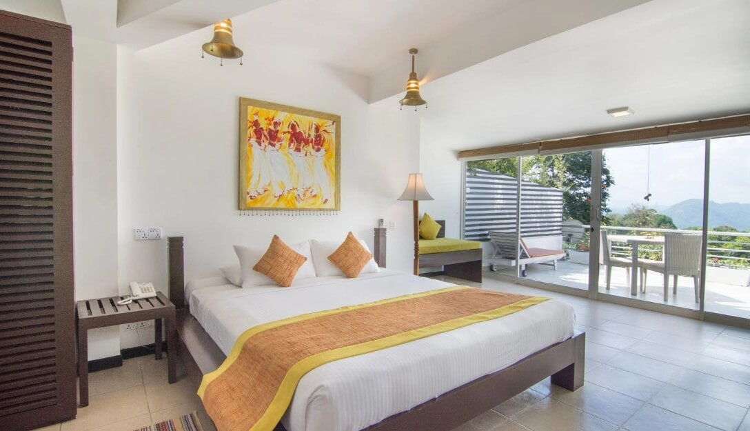 Relaxing Superior Ground Room with mountain views at Theva Residency