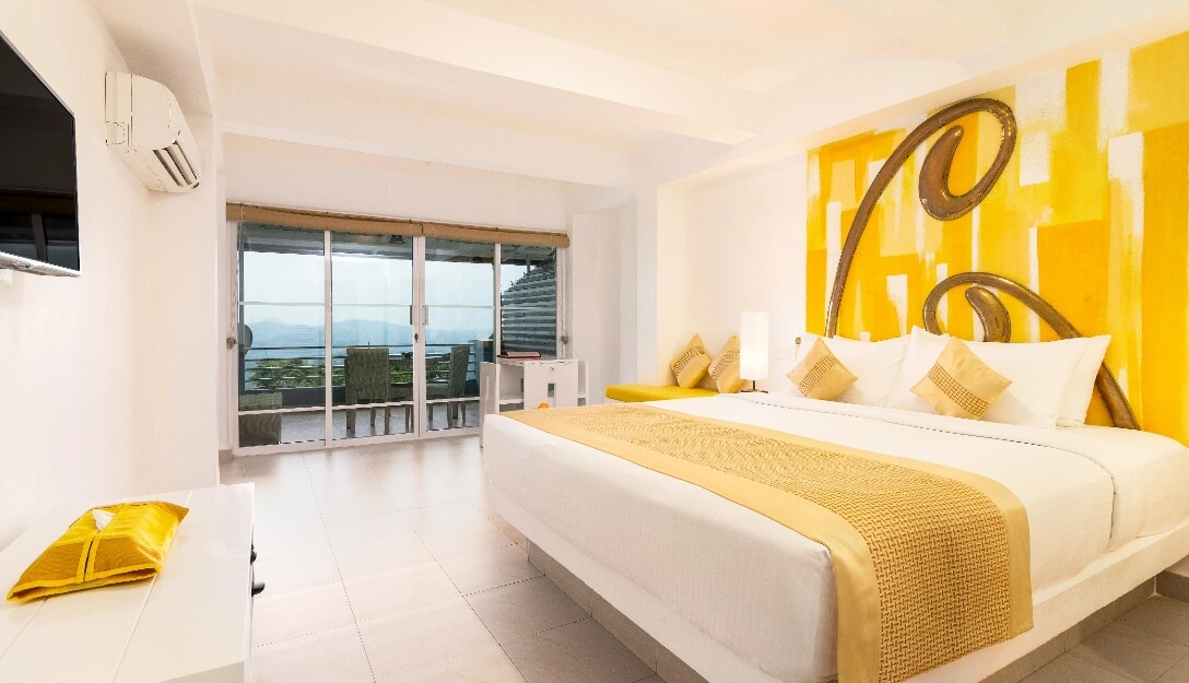 Luxurious yellow toned interior of Theva Superior Mountain Rooms