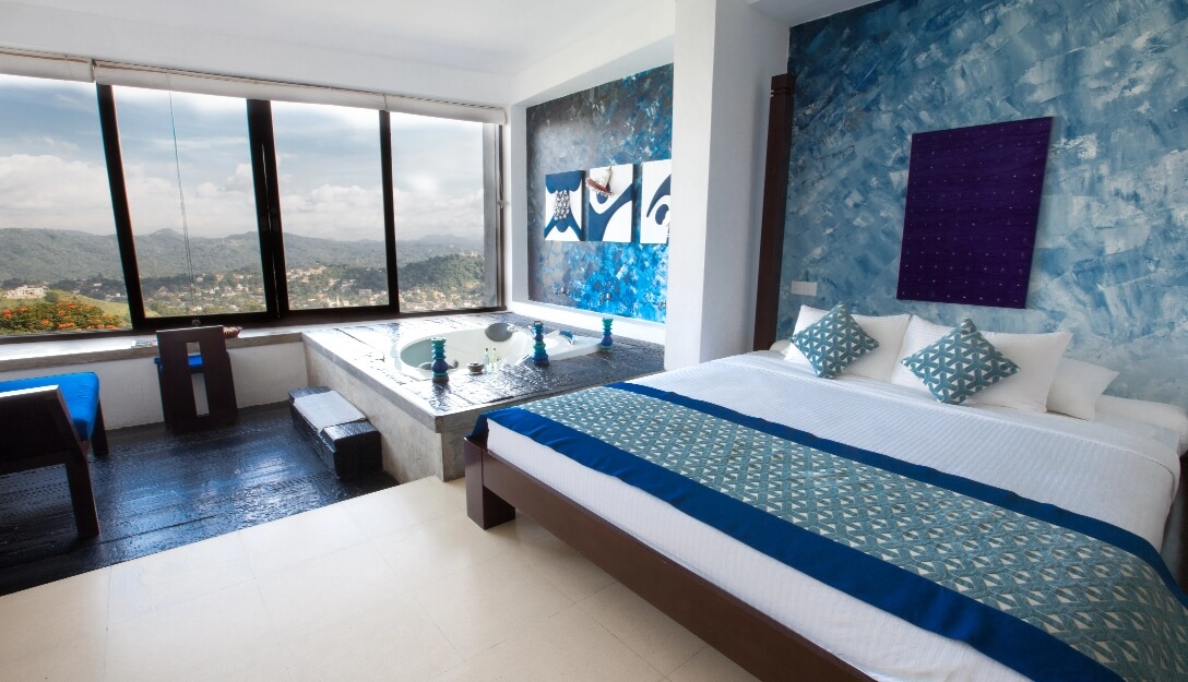 Relaxing jacuzzi awaits in suite at Theva Residency Kandy