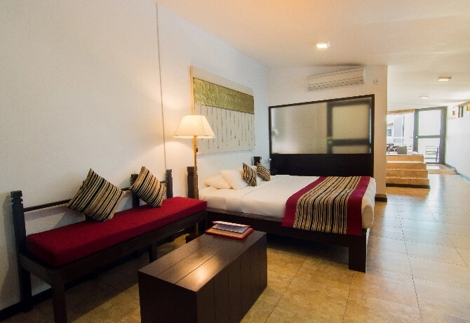 Elegant suite at Theva Residency offering comfort and style