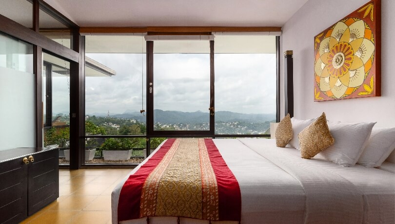 Theva Residency penthouse showcasing panoramic Hanthana mountain vistas