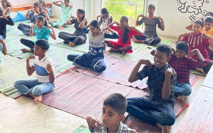 Supporting children through Seva project at Theva Residency