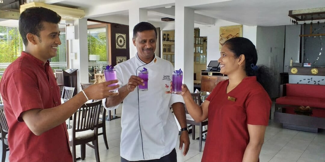 Theva Residency Kandy team tasting their signature welcome drinks